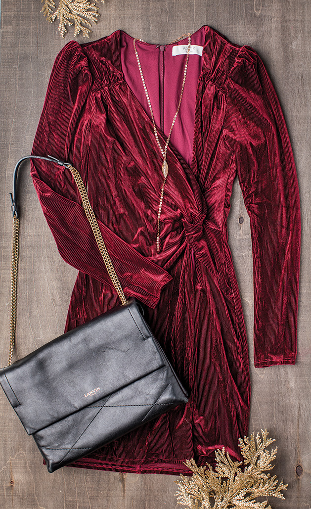 A red dress from Jori & June, necklace from Kenzington and a purse from Alexandra Eve Howe's personal collection.