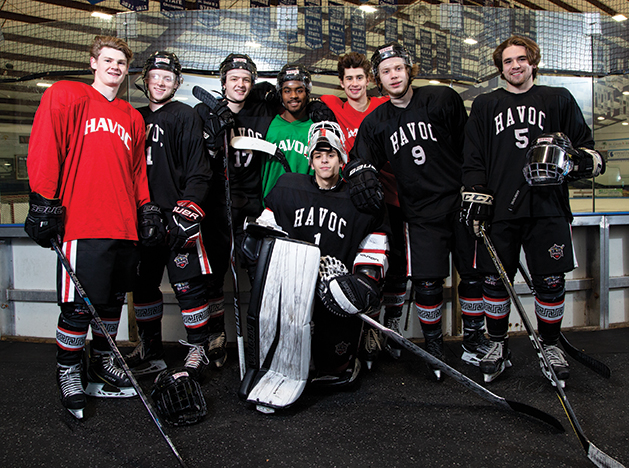 Players from the Hudson Havoc junior hockey team pose for a photo.