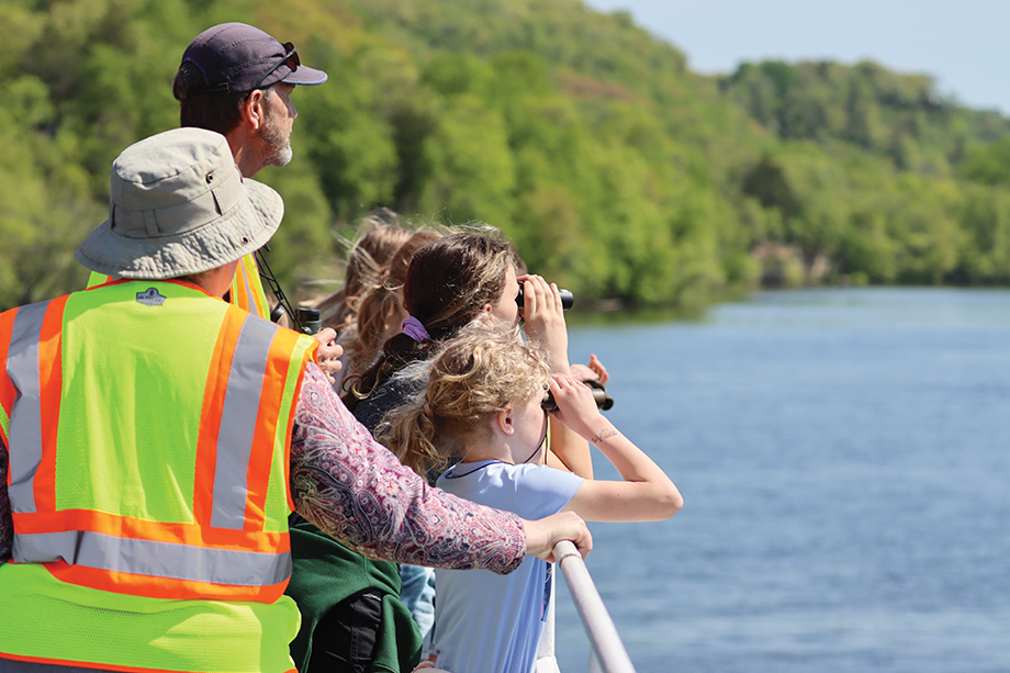  Students appreciate the sights and sounds of the St. Croix River on the Wild River Journey program. 