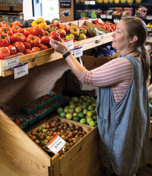 Trista Boe checks out the locally sourced and organic options at River Market Co-op.