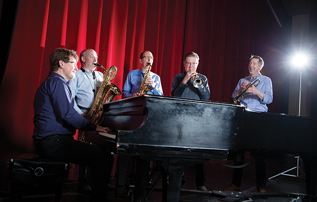 From left to right: Phil Kadidlo, piano Dennis Lindsay, baritone sax Larry Neumann, musical director and alto sax Scott Snyder, trumpet Mark Syman, trumpet