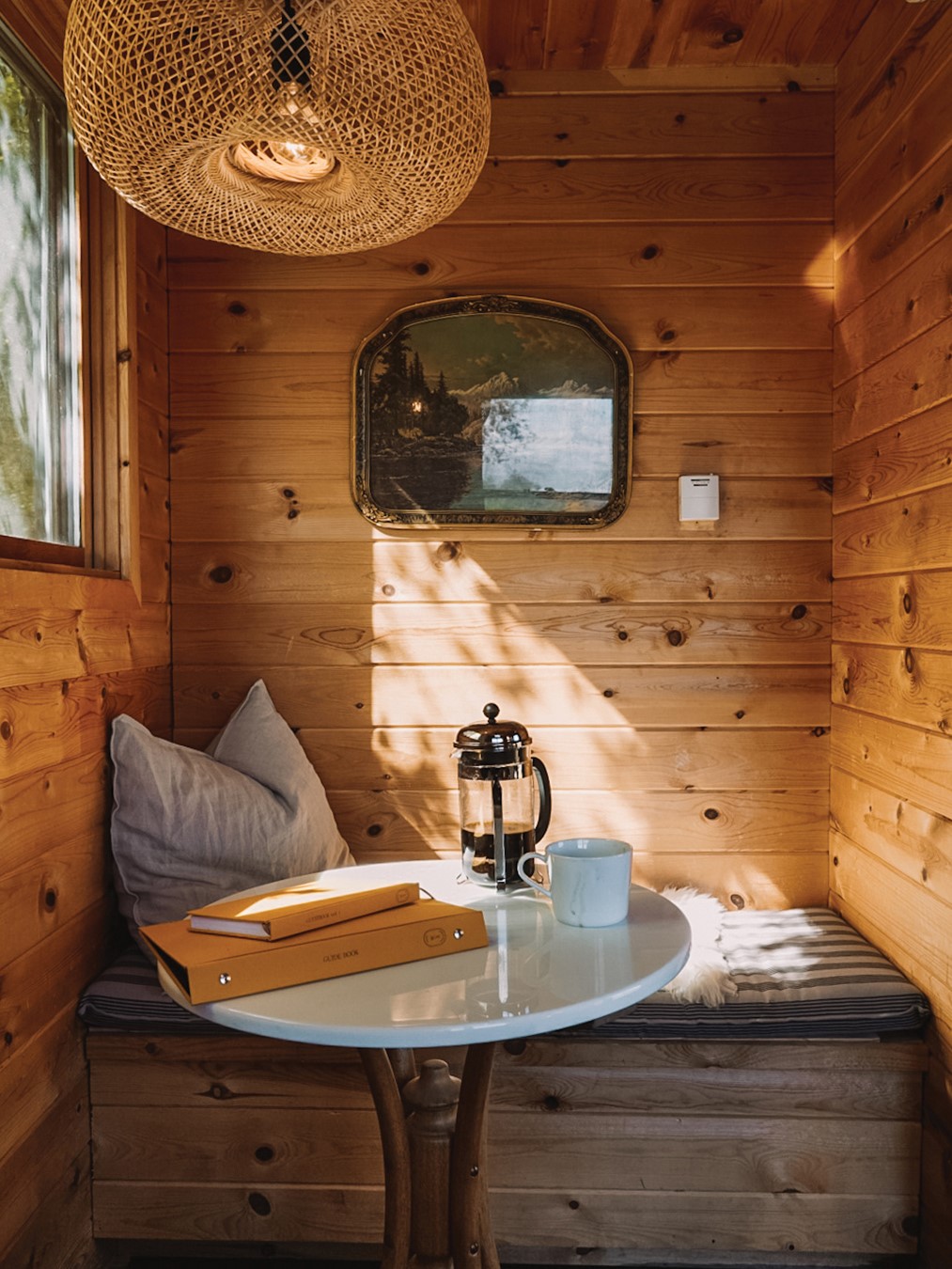 A cozy kitchenette is a staple of the Writers Cabin, perfect for quiet mornings.