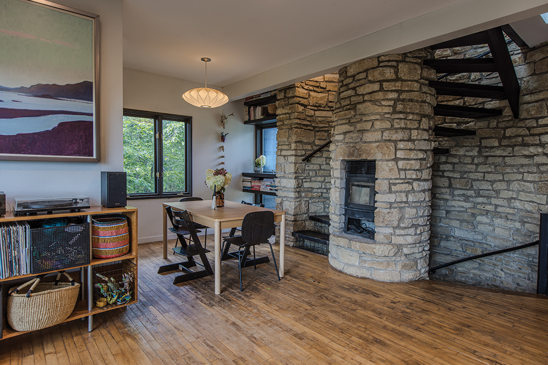 Second floor: The second level is the family’s primary living space with the dining room, the kitchen and the living room, along with a deck. Greg Elsner and Kadie Fredell have used organic materials and furnishings with simple, clean lines to keep the house feeling tranquil and connected to the natural setting.