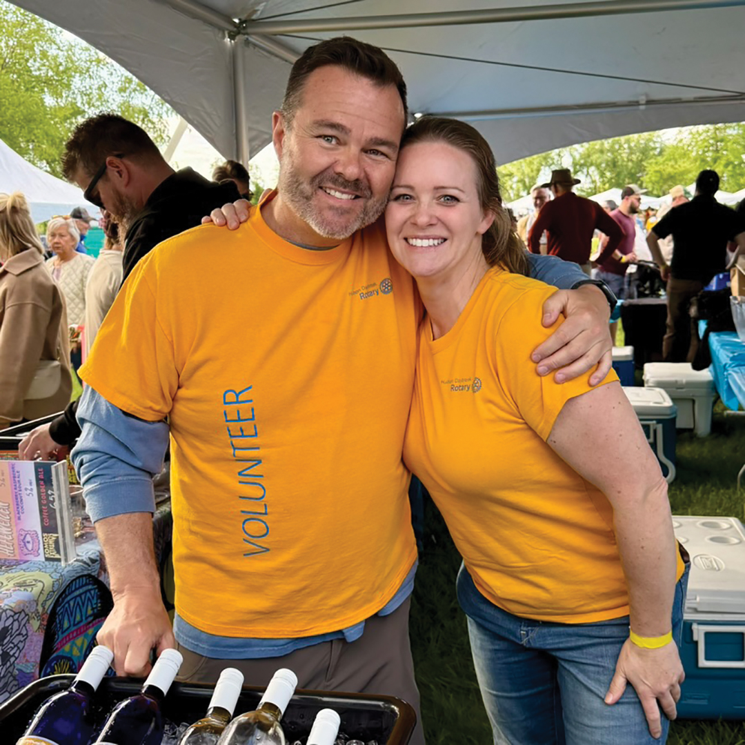 Two volunteers working at the Taste of the Valley event