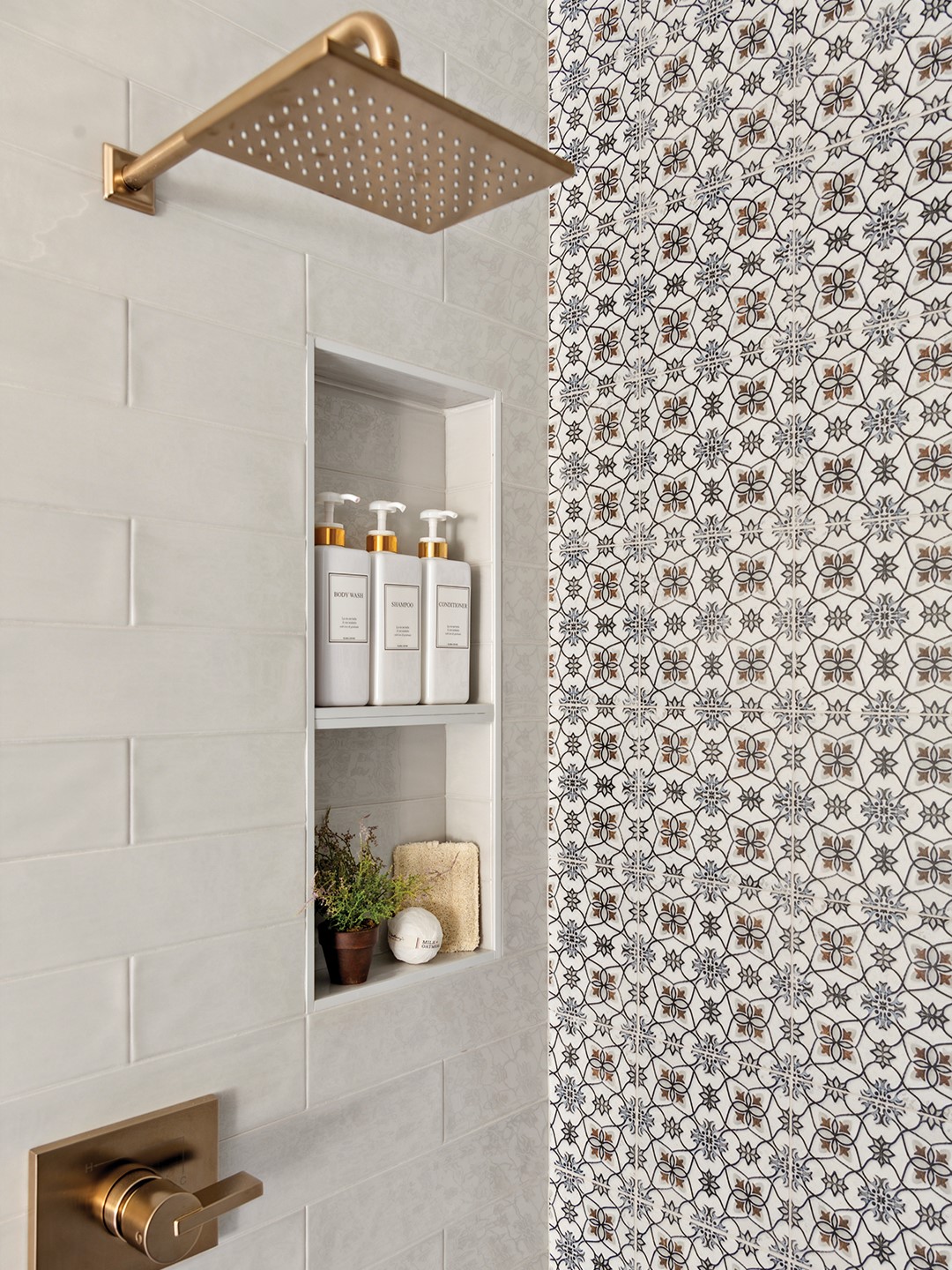 In the primary bathroom, the walk-in shower is the pièce de résistance. A colorful patterned tile on one wall of the shower makes a statement. “I just love how big [the shower] is and how that pattern makes it almost feel like wallpaper in there,” Amy Leferink says.