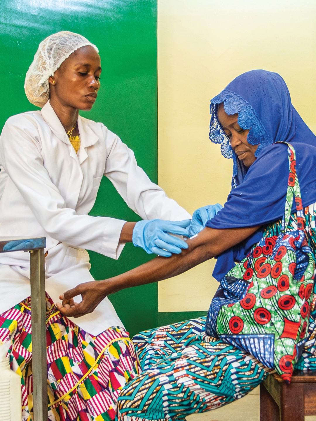 Routine testing for HIV viral load for a patient in anti-retroviral treatment at a Senitizo clinic in Bangui, Central African Republic.