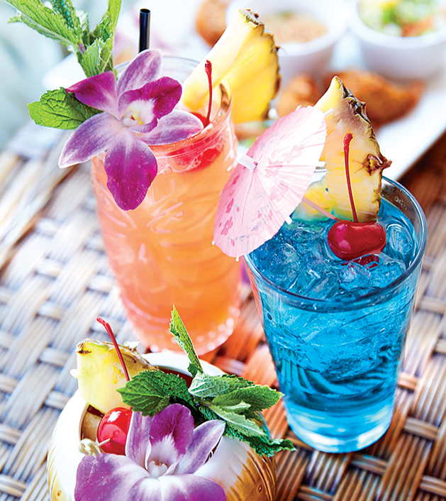 An assortment of springtime drinks: Zombie, Tilted Hawaiian, Blue Thing and Mai Tai. Blue Thing is off-menu, a "budget, big, boozy blue drink," owner Chris Goetzke says.