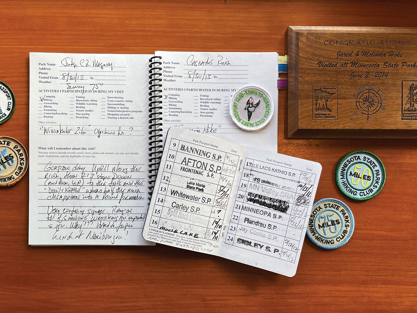 The Hokes tracked their journey with a provided Passport Club booklet. They received a stamp for each completed hike and journaled about their experiences in a travel log.