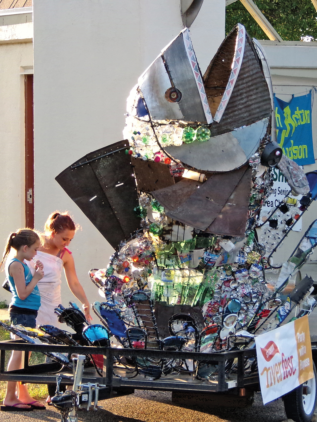 Scrappy fish statue made of garbage