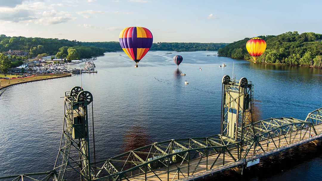 Drone Aerial Pictures Over Stillwater Downtown Summer Evening Hot Air Balloons above St Croix River