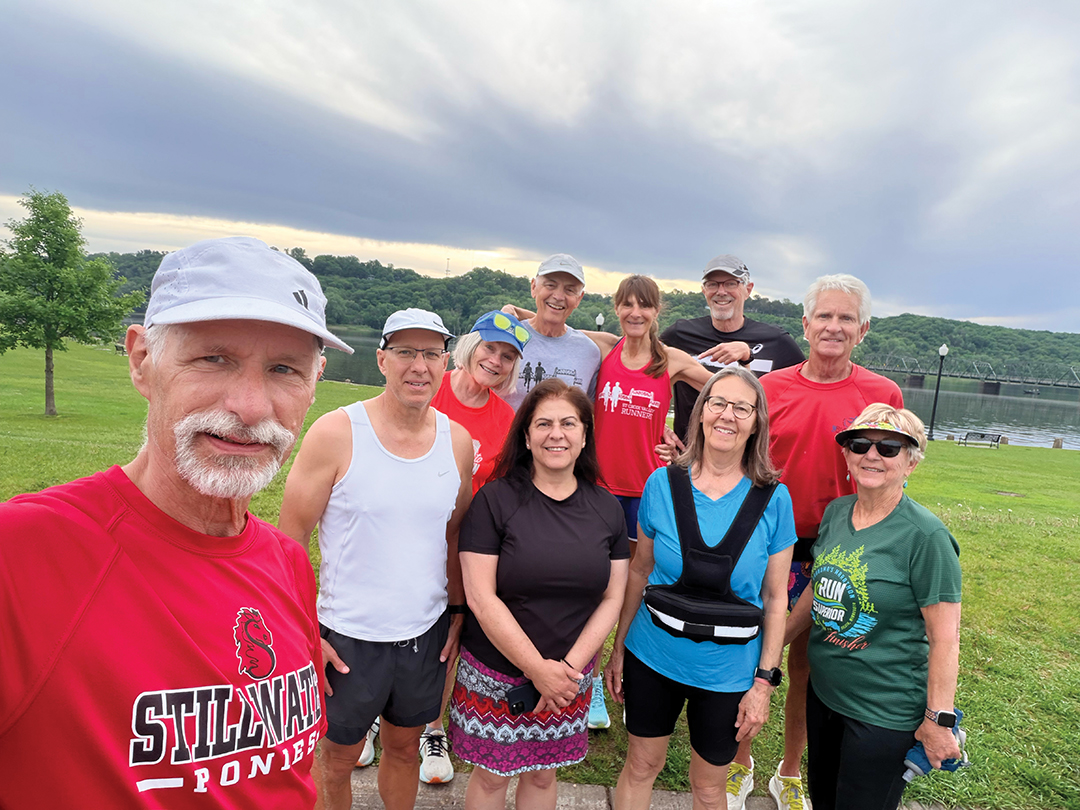 Mary Croft (bottom right) with other members of the St. Croix Valley Runners club.