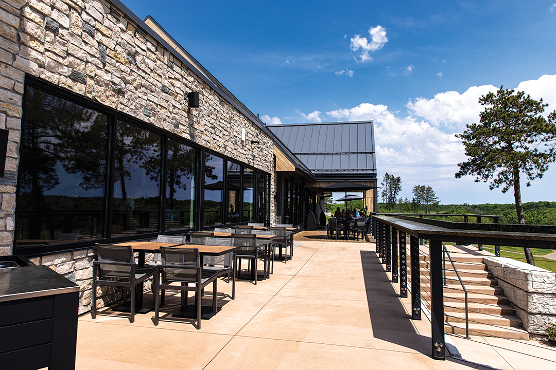 The expansive new patio seats 100 and looks out at the 18th and 19th holes, and the putting course.
