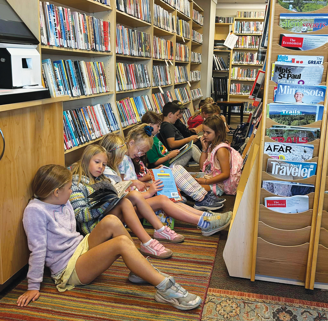 Students from Marine Village School enjoy special library hours at Marine Community Library, where they can use their laminated library cards (complete with their own signatures) to check out books.