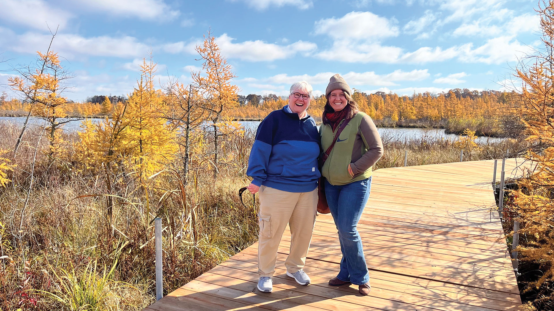Lori Maxfield and Barbara Heitkamp of the Washington Conservation District enjoy the new boardwalk at Irving & John Anderson County Park.